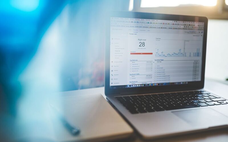 Web analytics report on a laptop screen